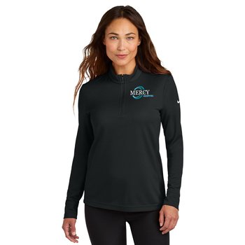 Nike ® Women's Essential 1/2-Zip Cover-Up- Embroidered Personalization Available from Positive Promotions