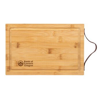 Bamboo Serving/Charcuterie Board with Leatherette Strap - Laser-Engraved Personalization Available from Positive Promotions